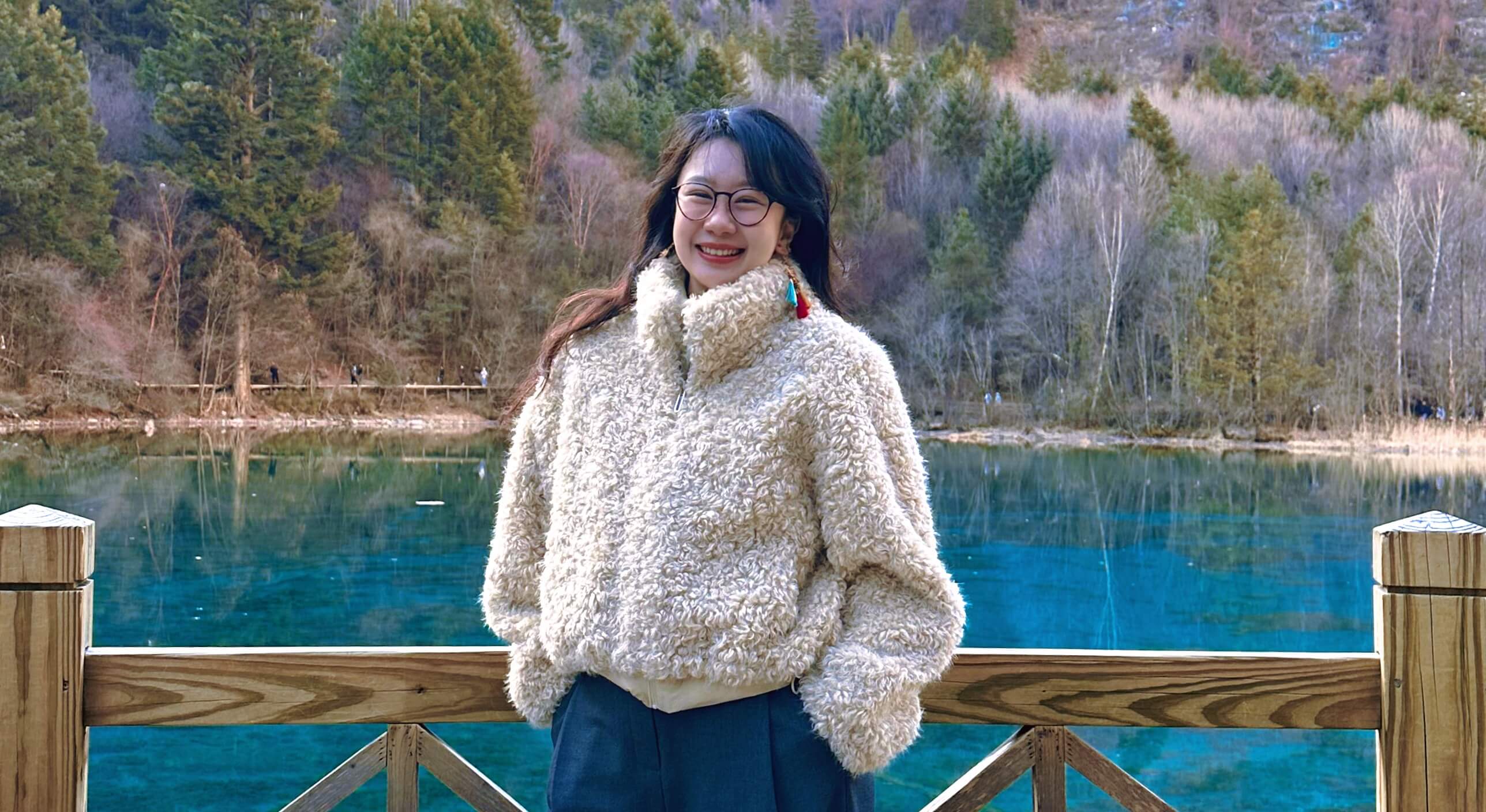Yu Zhang at a scenic lakeside